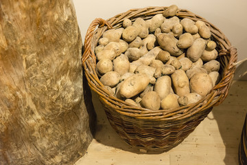 Basket with potatoes.