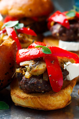 Beef  burger patties with oregano and feta cheese
