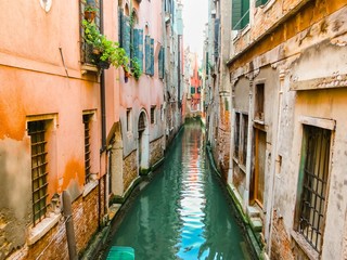 Fototapeta na wymiar Canals of Venice in the summer