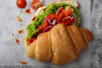 Salmon croissant with lettuce