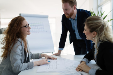 Fototapeta premium Group of architects working together on project