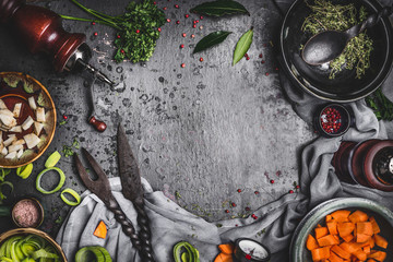 Rustic food cooking kitchen table background  with vegetarian ingredients and tools, top view, frame, horizontal