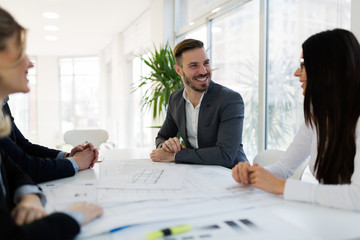 Group of architects working together on project