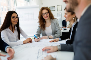 Group of architects working together on project