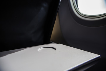 Airplane tray table on seat back