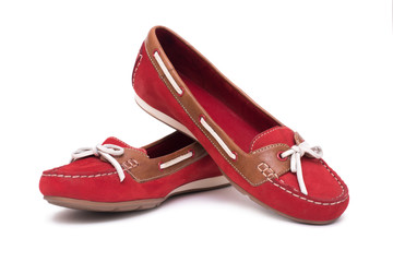 Red ballet shoes isolated on the white background.