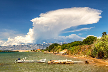 Coast of the Adriatic Sea at The Privlaka village, The Velebit Mountains on the background,...