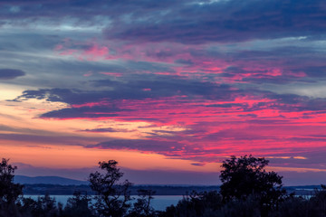 Fototapeta na wymiar Sunset with the clouds in beautiful colors on Adriatic Sea, Croatia, Europe.