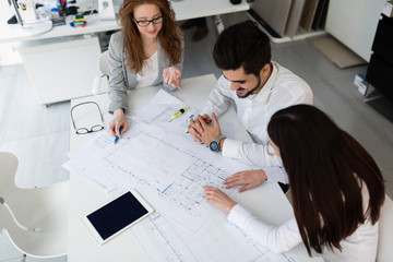 Group of architects working together on project