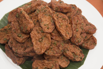 Close-up of fried fish cakes on a plate