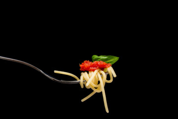 Pasta in black background.