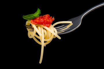 Pasta in black background.