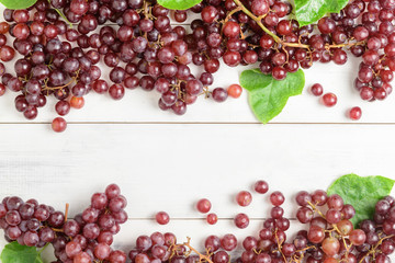 Fresh champagne Grapes on vintage white background