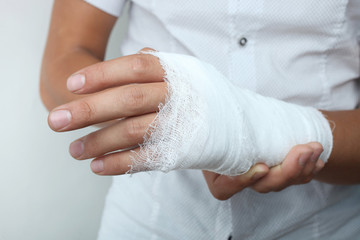 A guy with a bandaged hand