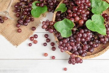 Fresh champagne Grapes on bamboo basket