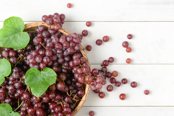 Fresh champagne Grapes on bamboo basket