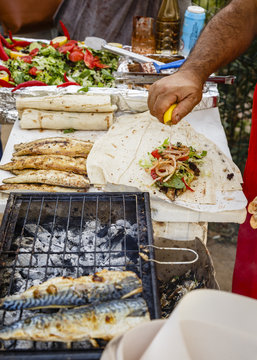 Stall making Ekmek Balik (grilled fish sandwich), Istanbul, Turkey.