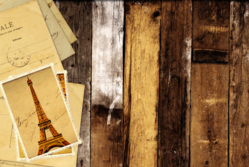Retro grunge cards with landmarks of Paris on wooden planks