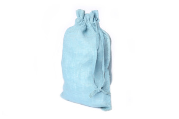 Blue jute  sack for present  isolated on white  Woven linen fabric packing bag.
