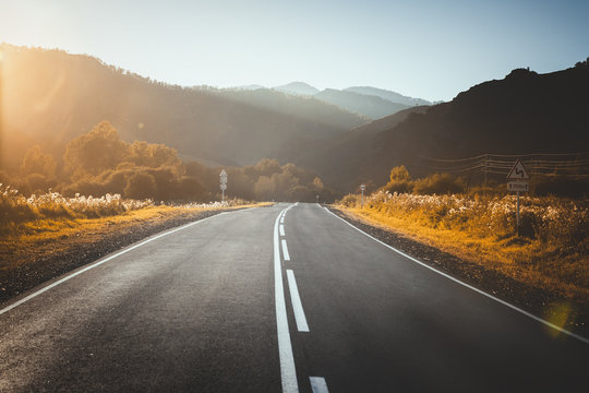 road in mountains. sunset.