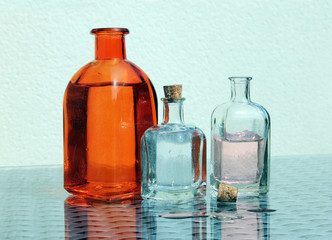 Obraz na płótnie Canvas Three Vintage Glass Jars
