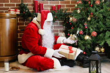 Santa Claus with gifts Christmas tree