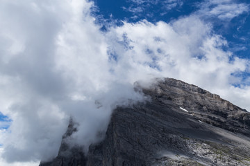 Mountain and big white cloud. Swiss