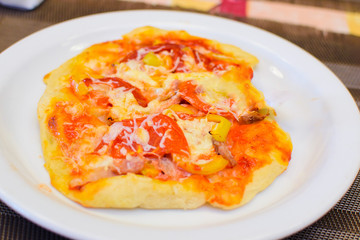 children cook pizza from raw ingredients