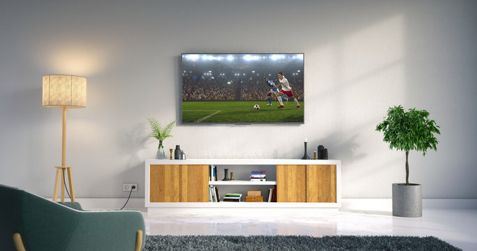 Living room led tv showing soccer game