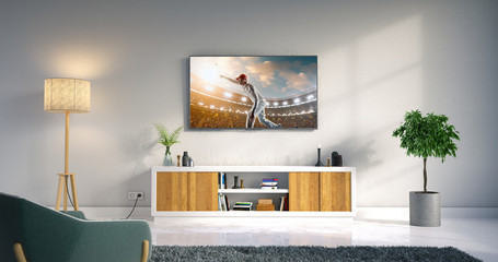 Living room led tv showing cricket game