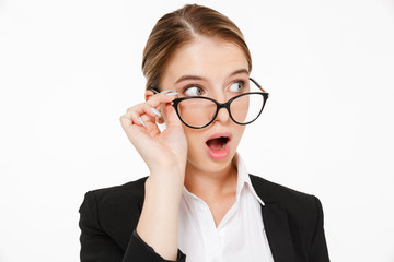 Close up picture of shocked blonde business woman in eyeglasses