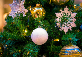 Christmas decorations on the branches of fir tree