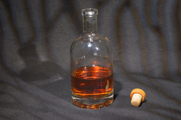 Whisky bottle behind start and the whole world