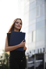 Girl with documents at a business meeting