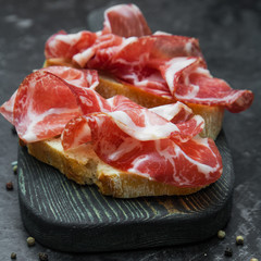A sandwich with Parma ham. Ciabatta.