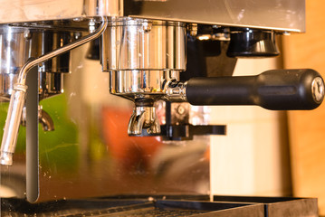 Fototapeta na wymiar portafilter on espresso machine