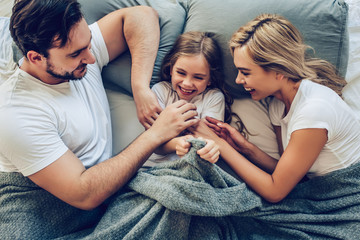 Family in bedroom