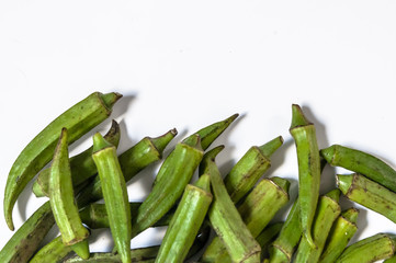 Fresh young okra isolated on white background