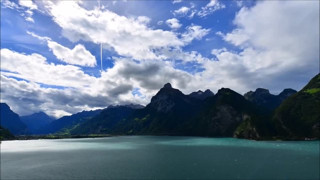 Wind over the mountains. Lake Lucerne with Oberbauenstock (2116m), Niderbauen-Chulm. Left Bristen 3073m