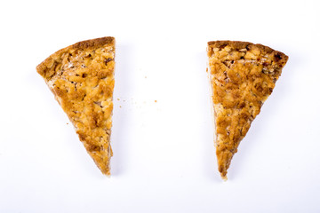 a piece of apple pie on a white background