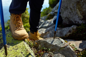 hiking boots on the rock in the mountains.