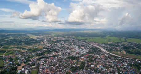 Nan city, Thailand. Panoramic aerial shot of Nan, the ancient city in the northern part of thailand along with the Nan river, the main river of thailand from the north