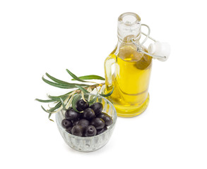 Black olives, olive oil and olive branch