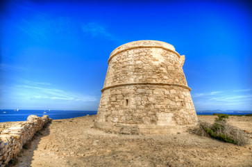 Fototapeta na wymiar defense tower of la gavina in Formentera