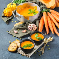 Fall autumn roasted orange pumpkin carrot soup with garlic