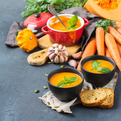 Fall autumn roasted orange pumpkin carrot soup with garlic