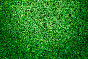 Fototapeta premium Artificial green grass texture for golf course. soccer field or sports background concept design.