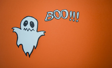 Scary white ghost design on black background with boo letters. Halloween celebration. Cartoon ghost wreath. Spooky and scary holiday monster design. Silhouette ghost creepy, funny and cute.