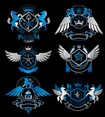 Naklejka premium Set of vector retro vintage insignias created with design elements like medieval castles, armory, wild animals, imperial crowns. Collection of coat of arms.