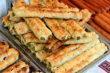 Puff pastry with filling. Rollini with brynza cheese and spinach